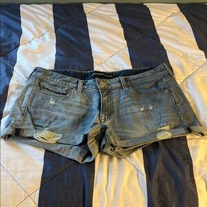 Express Women's Blue Denim Shorts - Destroyed - Size 10